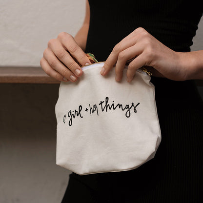 ["A Girl And Her Things Essentials Bag ", " Lifestyle Image ", " Uncommon James Home"]