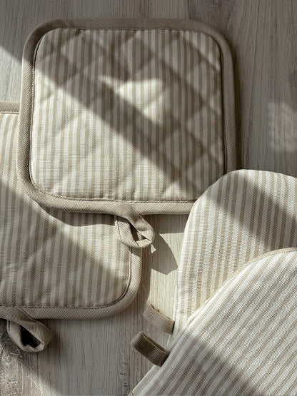 ["Tan Striped Pot Holder (Set of 2) ", " Lifestyle Image ", " Uncommon Lifestyle"]