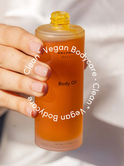["Body Oil ", " 100 ml / 3.38 fl oz ", " Product Detail Image ", " Uncommon Beauty"]
