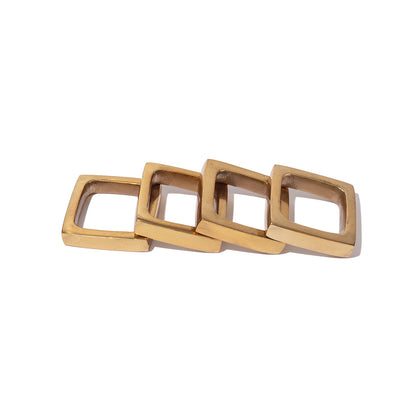 ["Napkin Rings Set of 4 ", " Gold ", " Product Image ", " Uncommon James Home"]