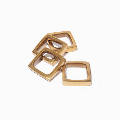 ["Napkin Rings Set of 4 ", " Gold ", " Product Detail Image 2 ", " Uncommon James Home"]