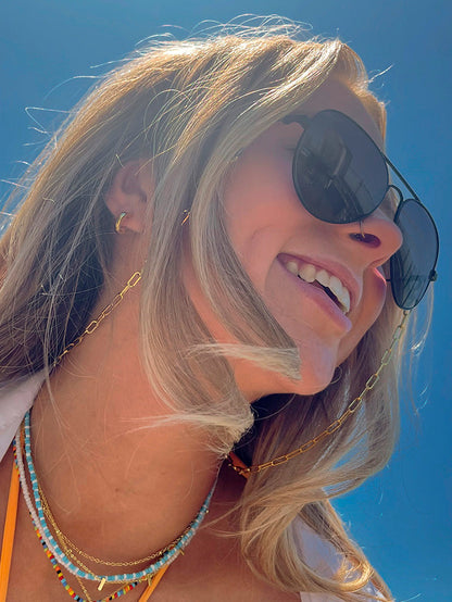 ["Aviator Sunglasses ", " Black ", " Lifestyle Image ", " Uncommon Lifestyle"]
