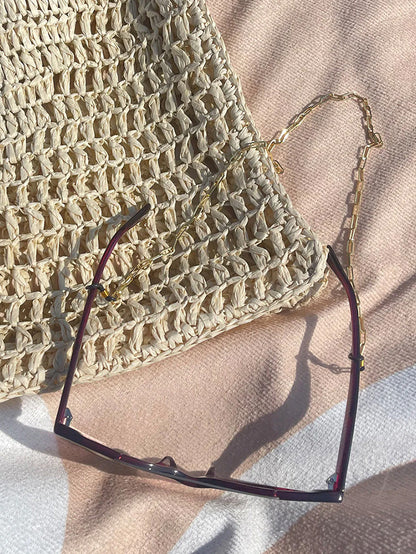 ["Sunglasses Chain ", " Gold ", " Lifestyle Image ", " Uncommon Lifestyle"]