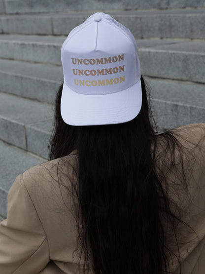 ["Uncommon Ombré Hat ", " White ", " Model Image ", " Uncommon Lifestyle"]