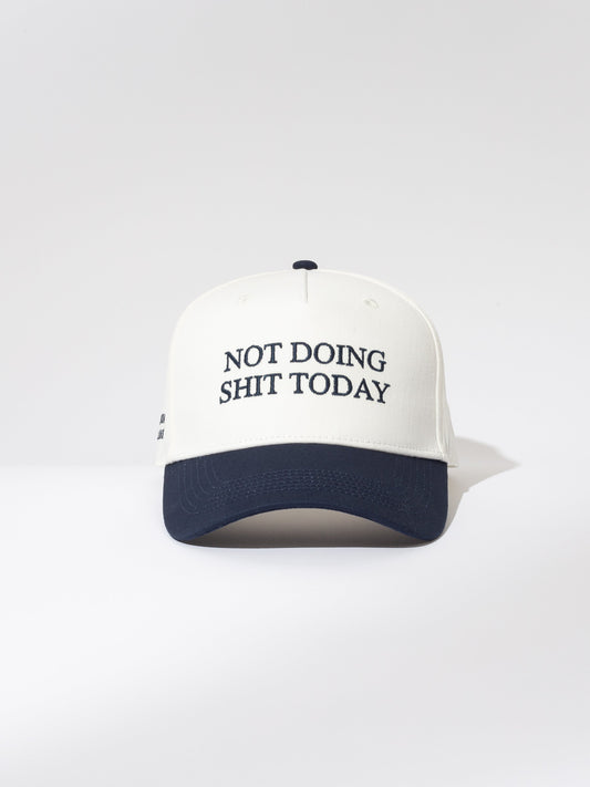 Day Off Trucker Hat | White and Navy | Model Image | Uncommon Lifestyle 