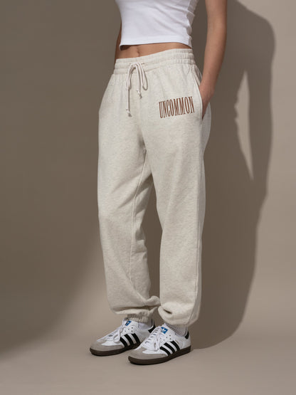 ["Forever Uncommon Sweatpants ", " Brown ", " Model Image ", " Uncommon Lifestyle"]