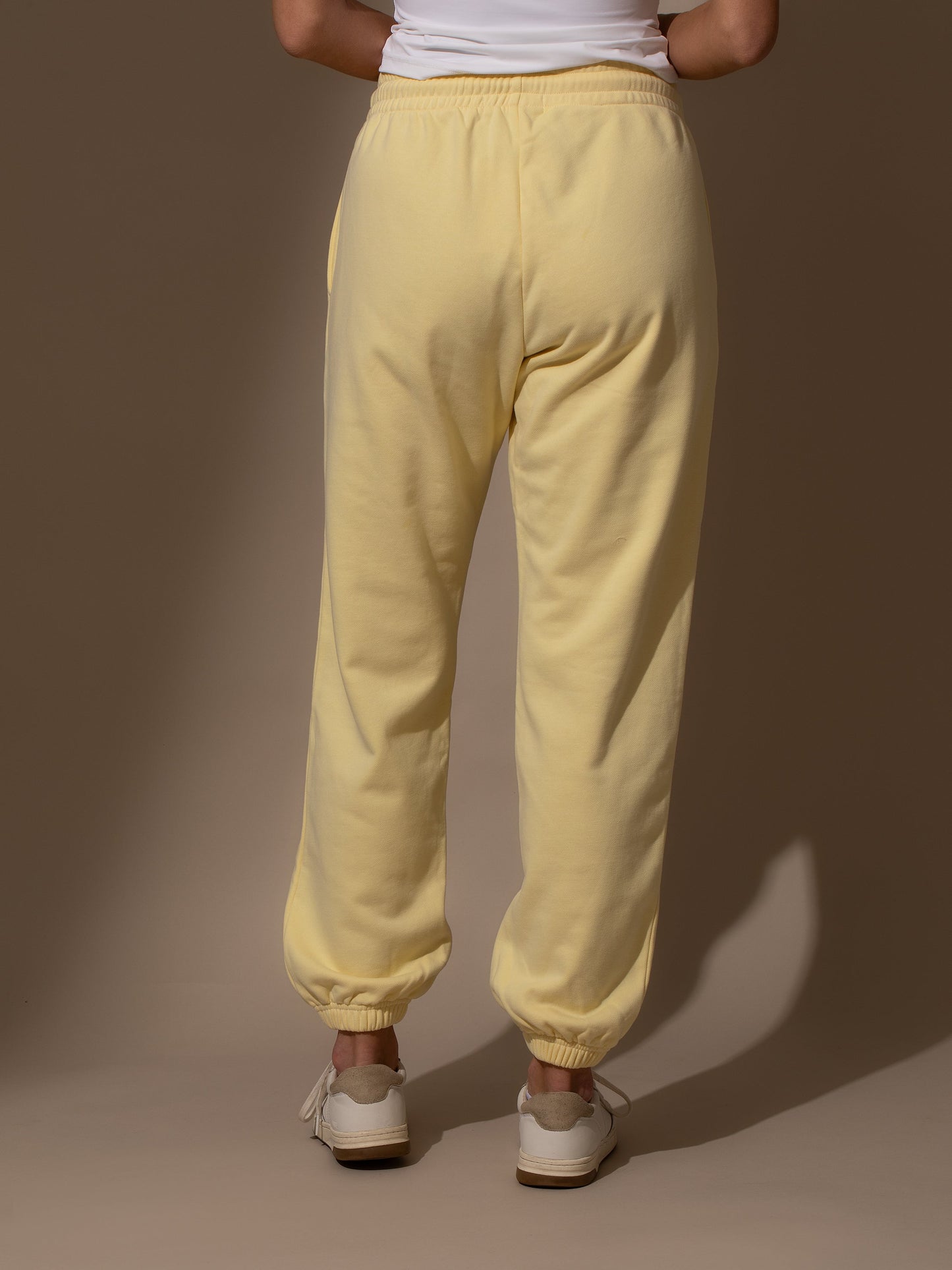 Forever Uncommon Sweatpants | Yellow | Model Image | Uncommon Lifestyle