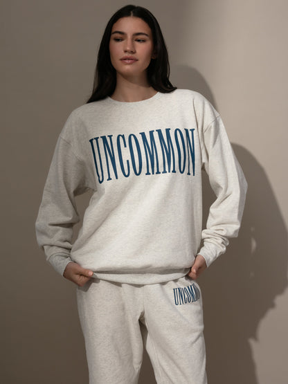 ["Forever Uncommon Sweatshirt ", " Navy ", " Model Image ", " Uncommon Lifestyle"]