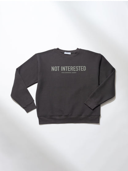 ["Not Interested Crewneck Sweatshirt ", " Dark Gray ", " Product Image ", " Uncommon Lifestyle"]
