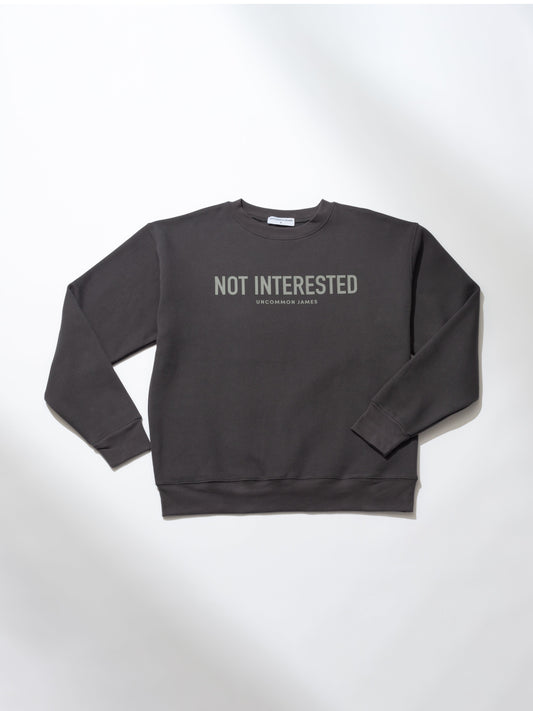 Not Interested Crewneck Sweatshirt | Dark Gray | Model Image | Uncommon Lifestyle