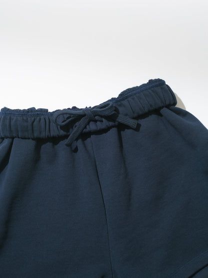 ["That Girl Sweat Short ", " Navy ", " Product Detail Image ", " Uncommon Lifestyle"]