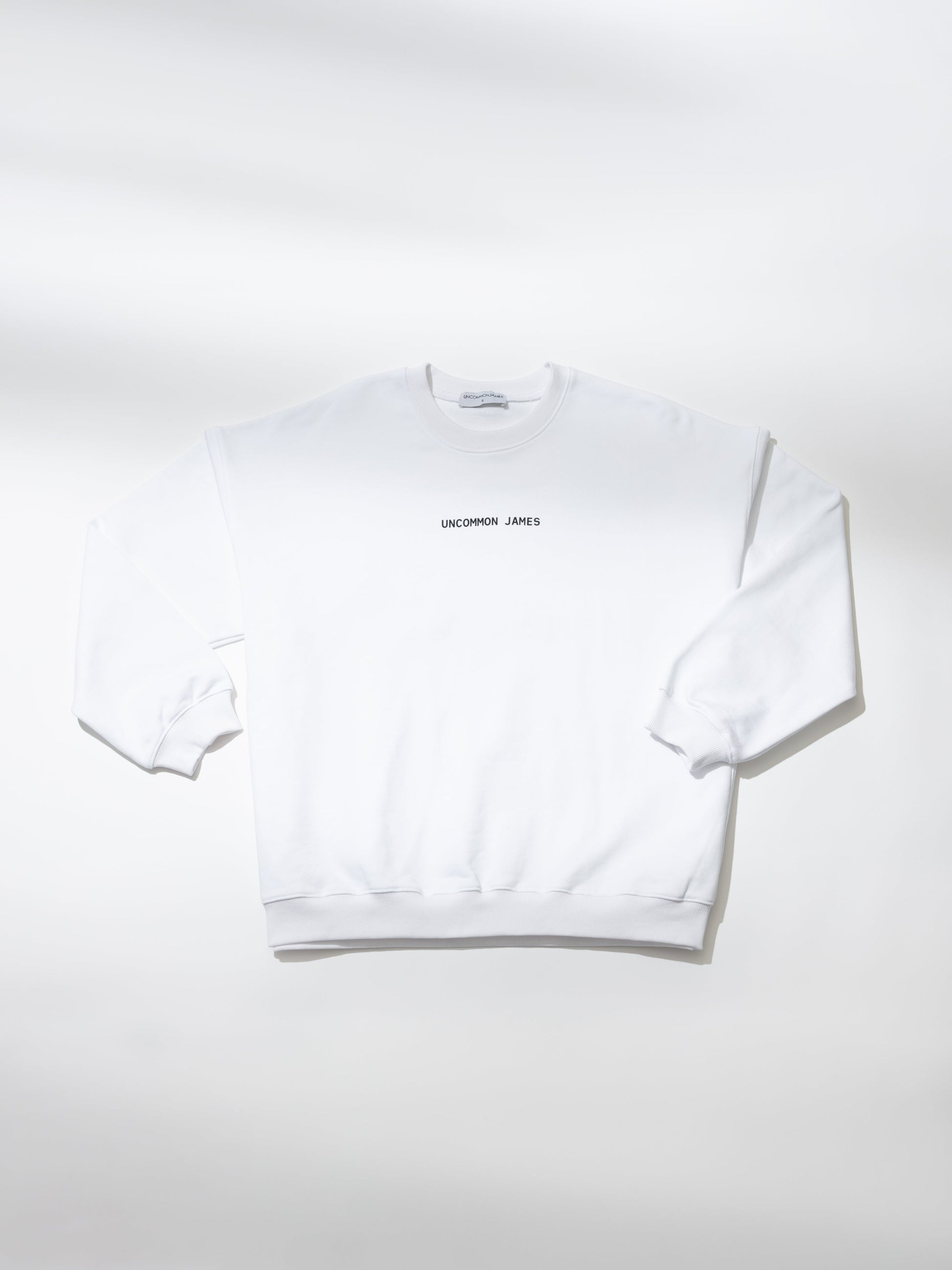 UJ Tour Sweatshirt | White | Product Image | Uncommon Lifestyle