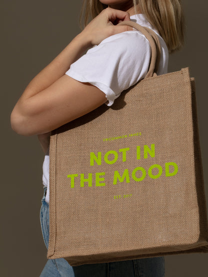 ["Not In The Mood Jute Tote Bag ", " Model Image 2 ", " Uncommon Lifestyle"]