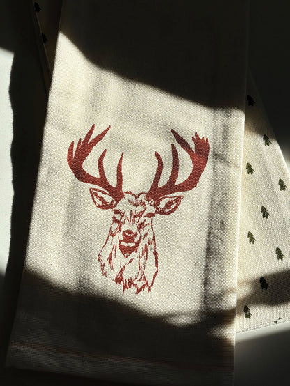 ["Winter Buck Dish Towel (Set of 2) ", " Lifestyle Image ", " Uncommon Lifestyle"]