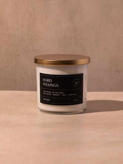 ["Hard Feelings Candle ", " 16 OZ ", " Product Image ", " Uncommon Lifestyle"]