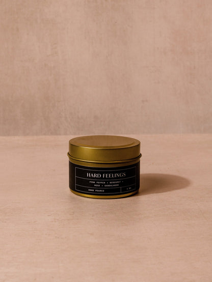 ["Hard Feelings Candle ", " 4 OZ ", " Product Image ", " Uncommon Lifestyle"]