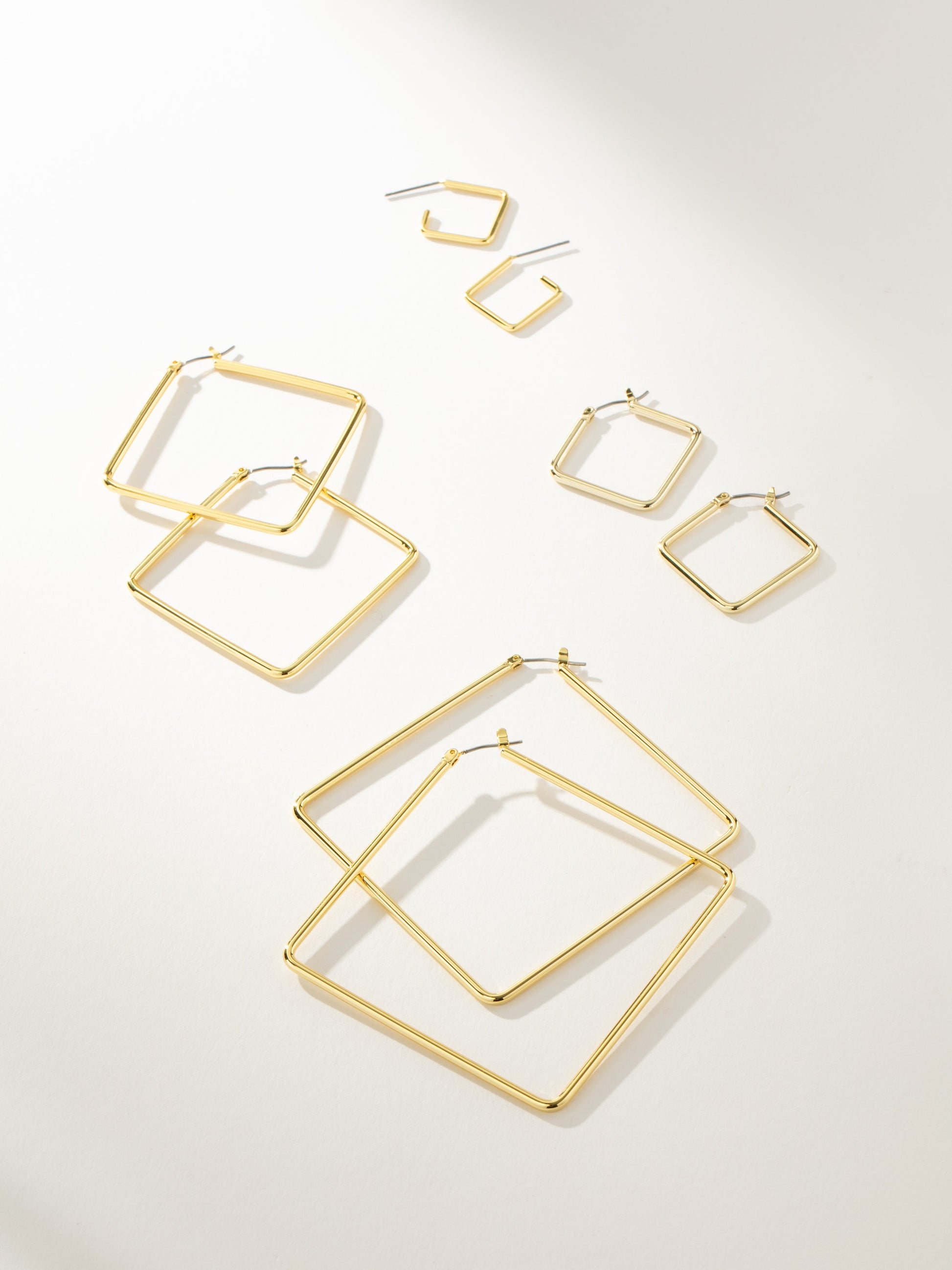 Boss Hoop Earrings | Gold | Group Image | Uncommon James