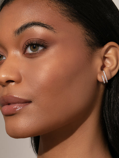 ["Double Vision Ear Climber ", " Sterling Silver Clear ", " Model Image ", " Uncommon James"]