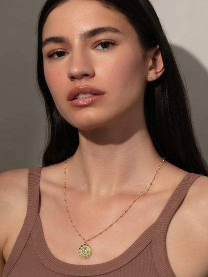 ["Atocha Pendant Necklace ", " Gold Large ", " Model Image ", " Uncommon James"]