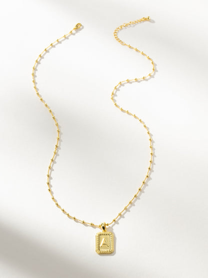 ["Sur Necklace ", " Gold ", " Product Image ", " Uncommon James"]