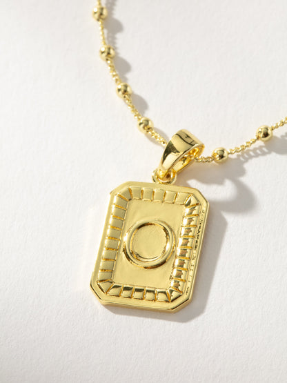 ["Sur Necklace ", " Gold O ", " Product Image ", " Uncommon James"]
