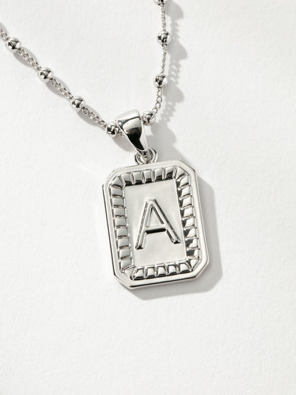 ["Sur Necklace ", " Silver A ", " Product Image ", " Uncommon James"]