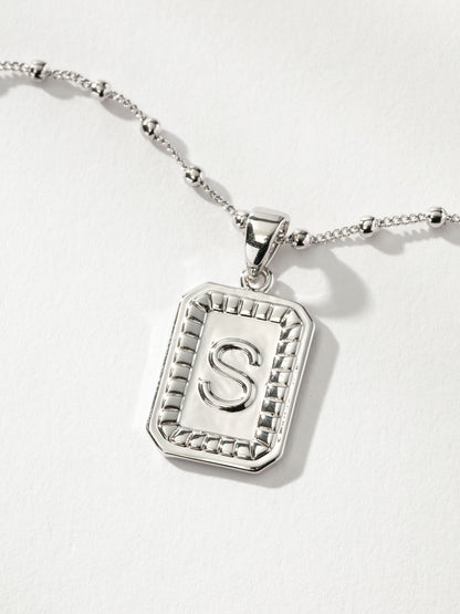 ["Sur Necklace ", " Silver S ", " Product Image ", " Uncommon James"]