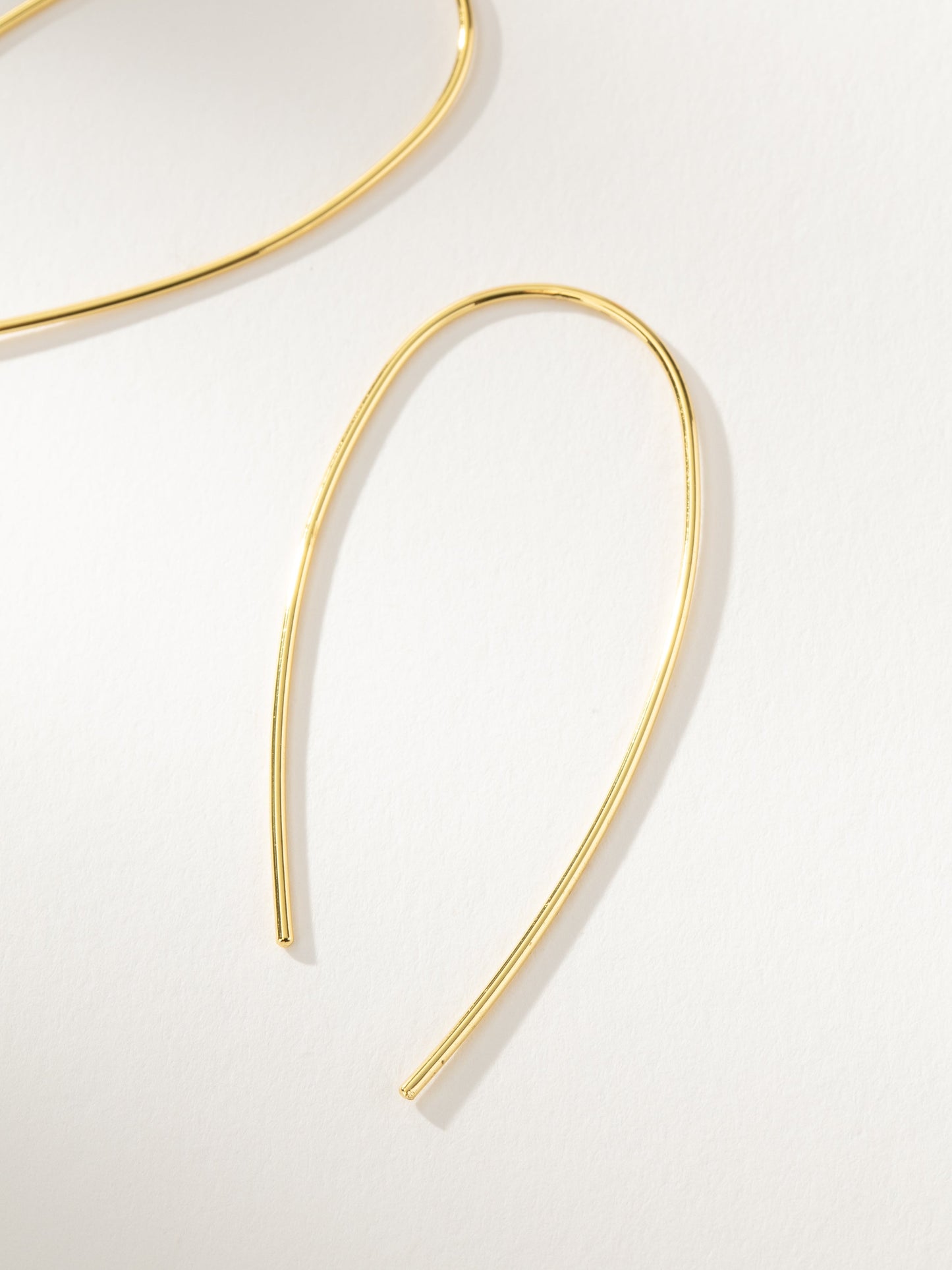 Hole in One Earrings | Gold | Product Detail Image | Uncommon James