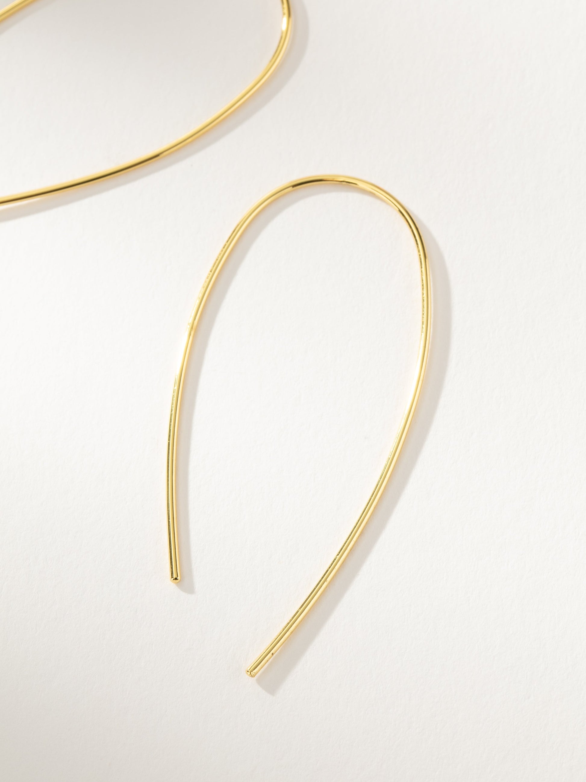 Hole in One Earrings | Gold | Product Detail Image | Uncommon James