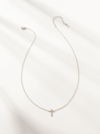 ["Simple Cross Necklace ", " Sterling Silver ", " Product Image ", " Uncommon James"]