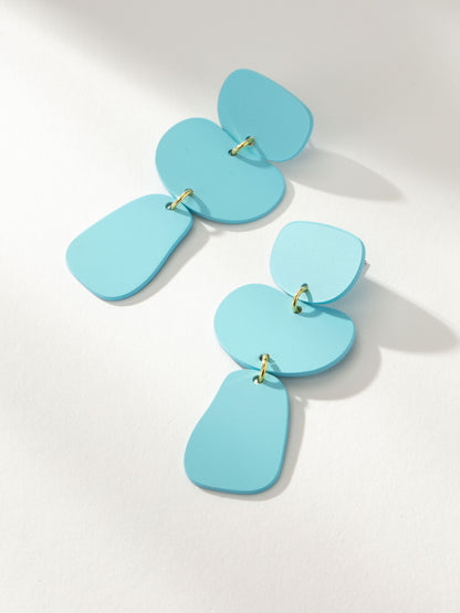 ["Nudist Earrings ", " Gold Blue ", " Product Image ", " Uncommon James"]