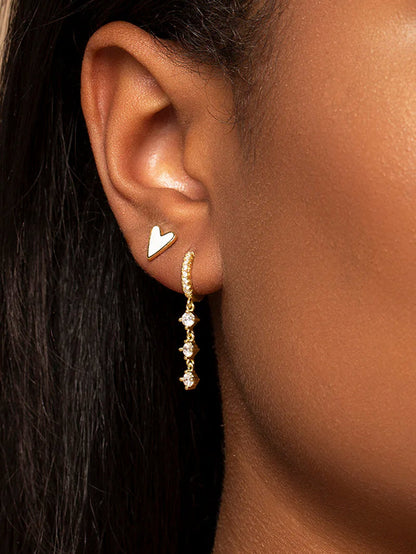 ["White Heart Studs ", " Gold ", " Model Image ", " Uncommon James"]