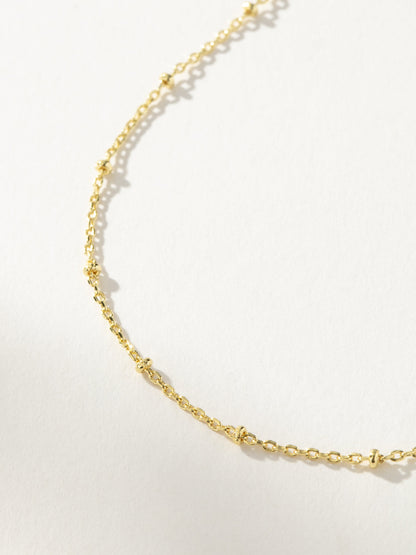 ["Little One Necklace ", " Gold ", " Product Detail Image ", " Uncommon James"]