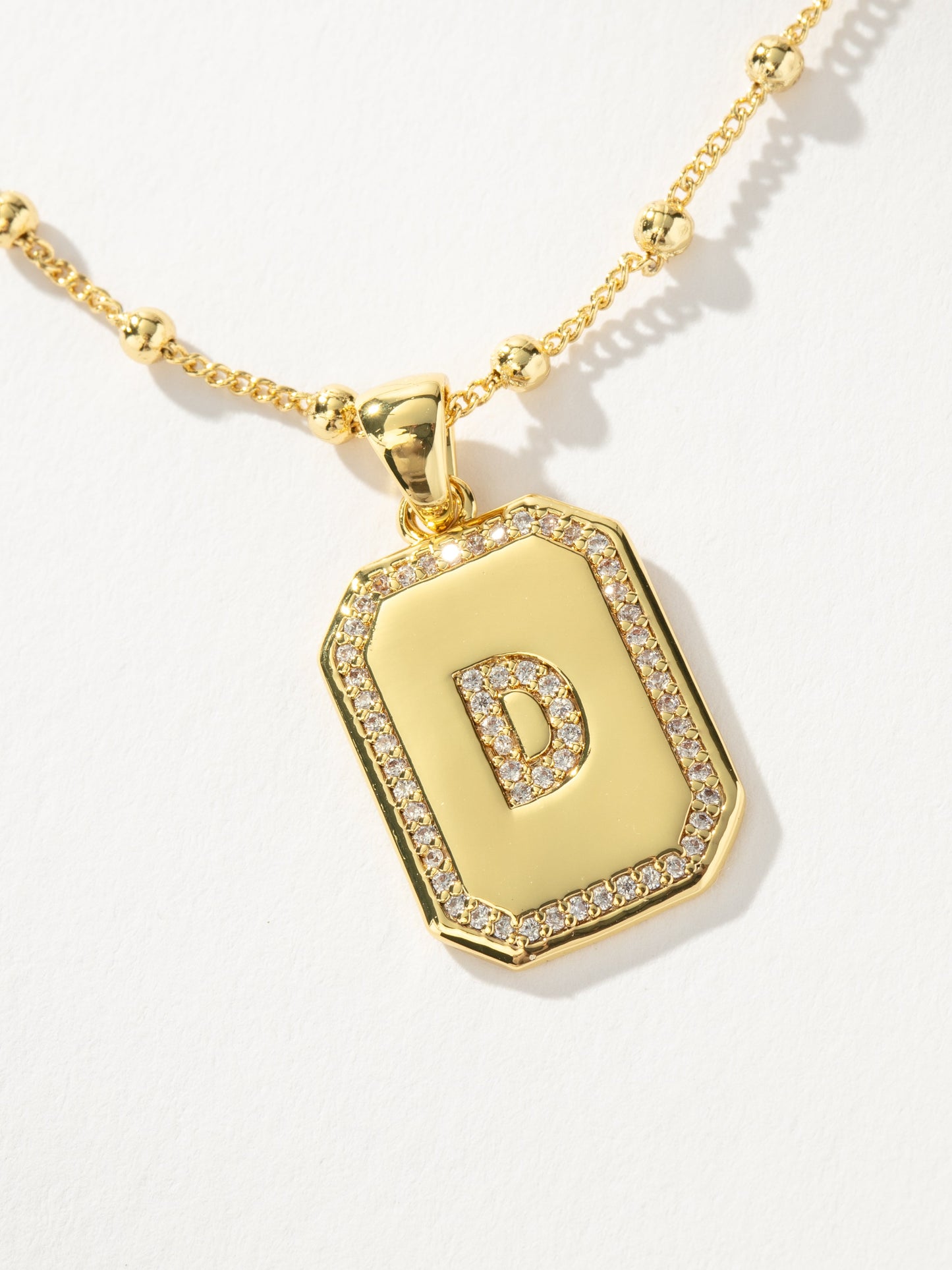Sur 2.0 Necklace | Gold D | Product Detail Image | Uncommon James