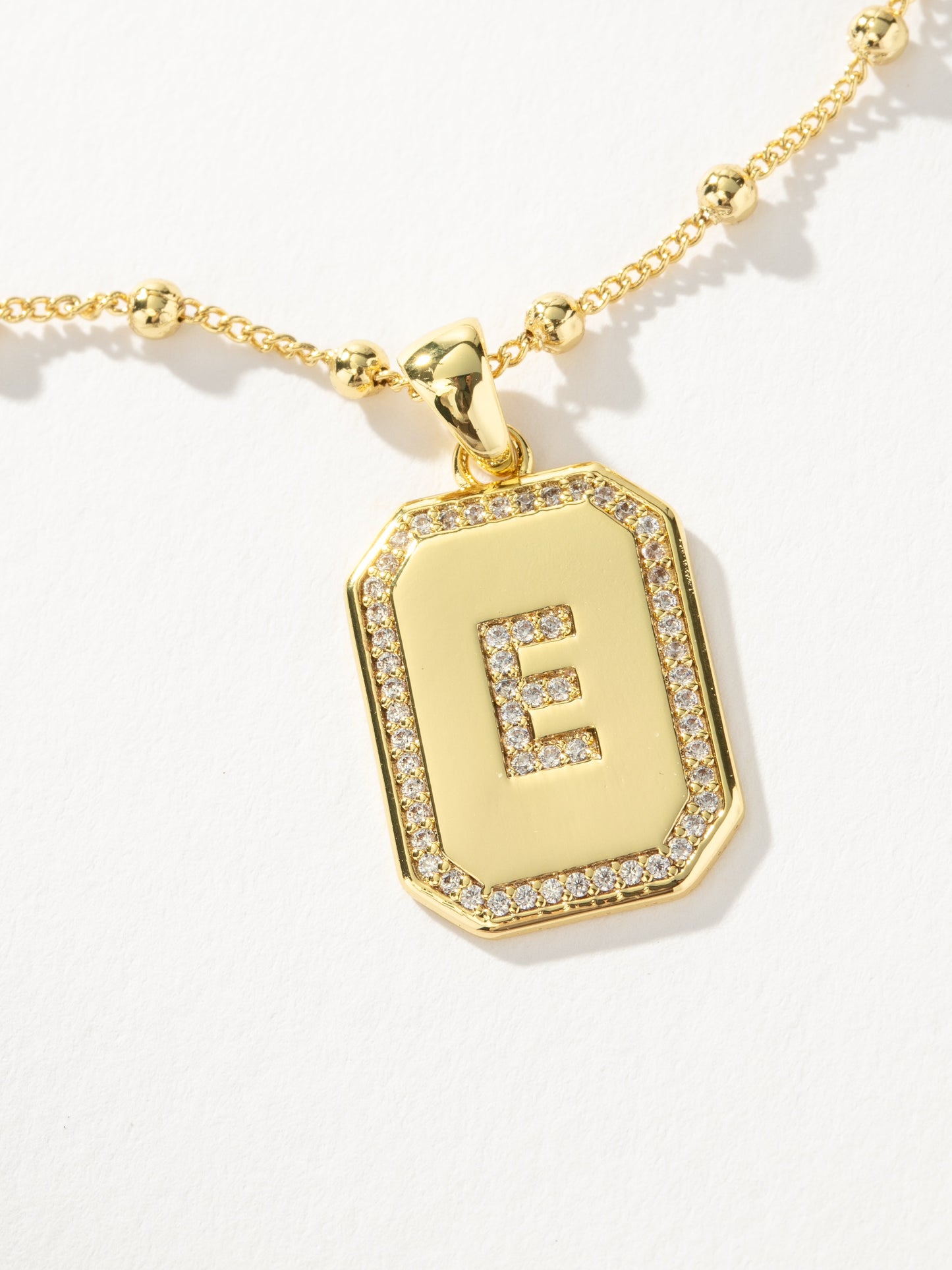 Sur 2.0 Necklace | Gold E | Product Detail Image | Uncommon James