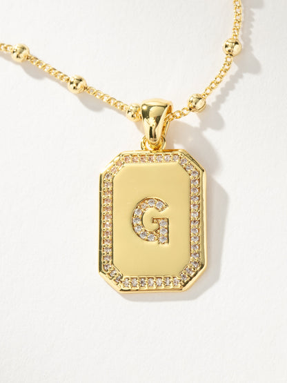 ["Sur 2.0 Necklace ", " Gold G ", " Product Detail Image ", " Uncommon James"]