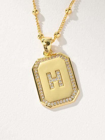 ["Sur 2.0 Necklace ", " Gold H ", " Product Detail Image ", " Uncommon James"]
