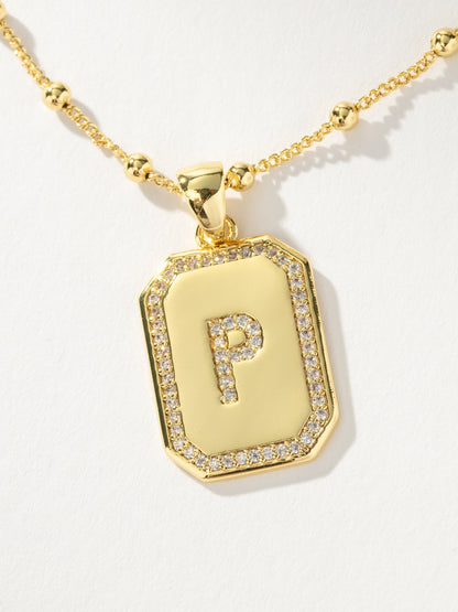 ["Sur 2.0 Necklace ", " Gold P ", " Product Detail Image ", " Uncommon James"]