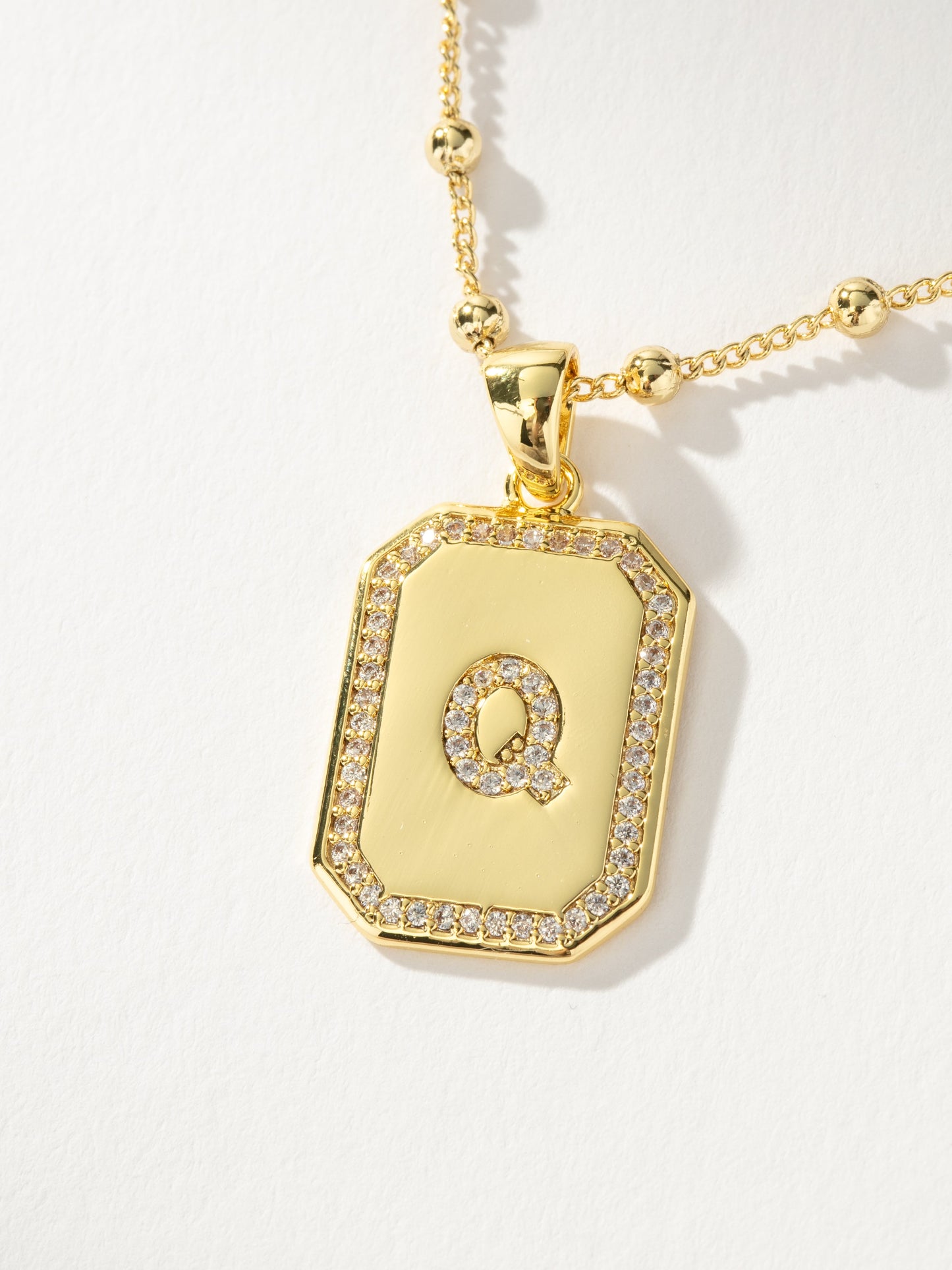 Sur 2.0 Necklace | Gold Q | Product Detail Image | Uncommon James