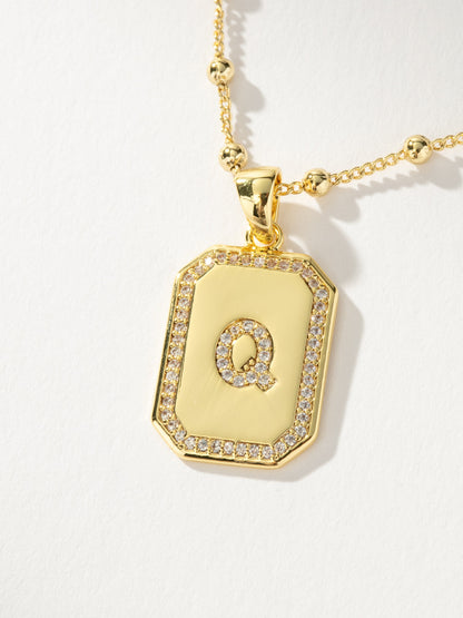 ["Sur 2.0 Necklace ", " Gold Q ", " Product Detail Image ", " Uncommon James"]