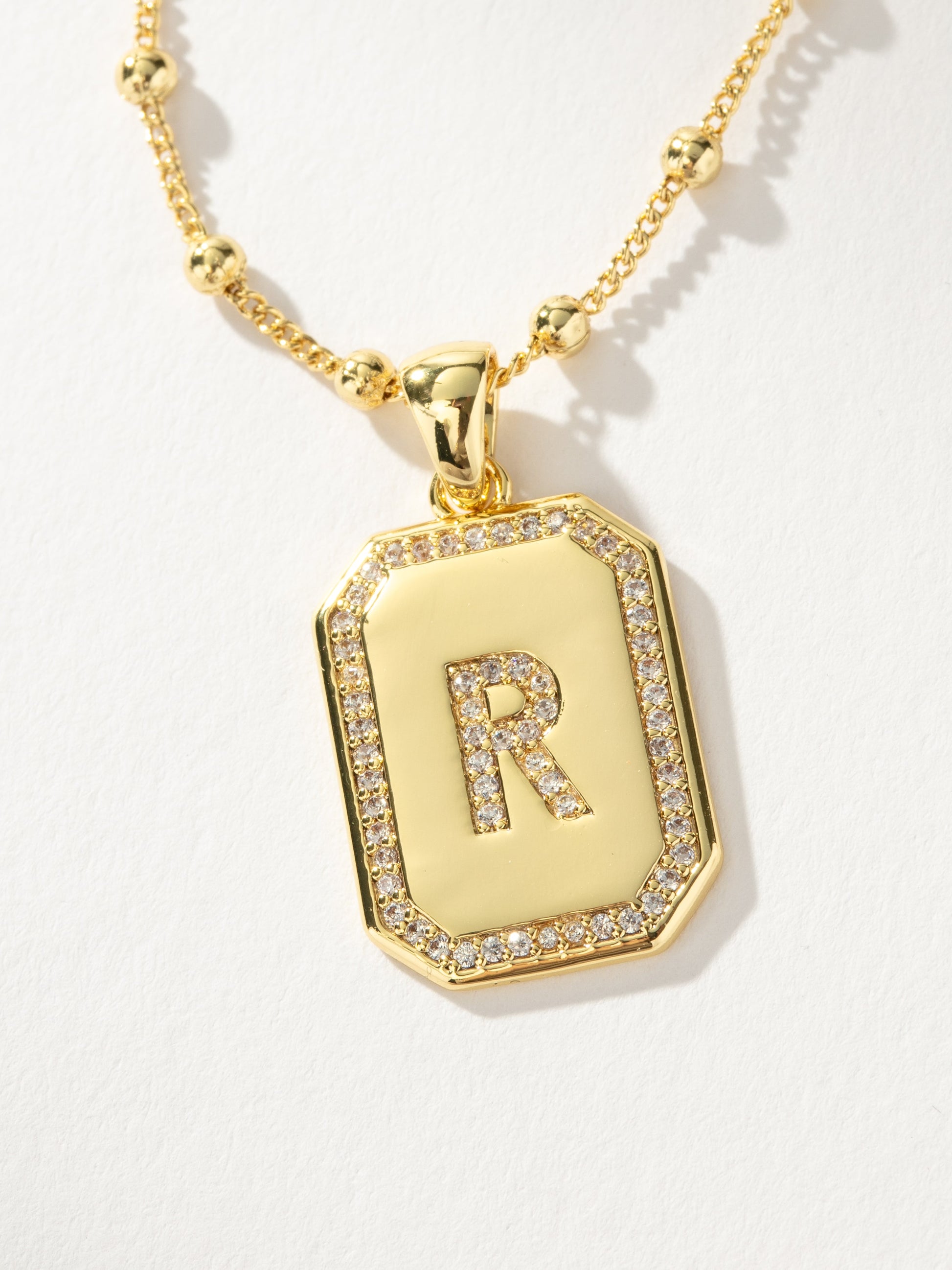 Sur 2.0 Necklace | Gold R | Product Detail Image | Uncommon James