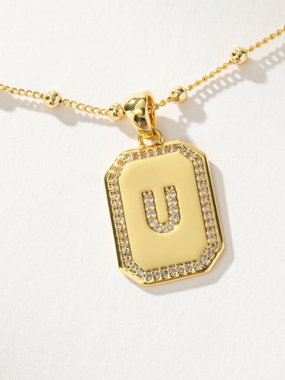 ["Sur 2.0 Necklace ", " Gold U ", " Product Detail Image ", " Uncommon James"]