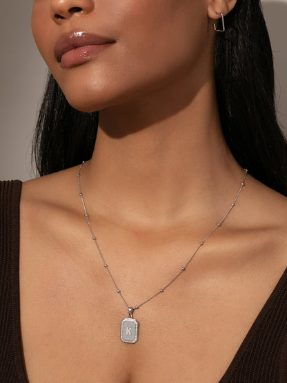 ["Sur 2.0 Necklace ", " Sterling Silver ", " Model Image ", " Uncommon James"]