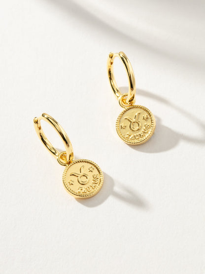 ["Zodiac Huggies ", " Gold Taurus ", " Product Image ", " Uncommon James"]