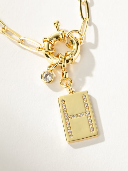 ["Initial Chain Necklace ", " Gold H ", " Product Detail Image ", " Uncommon James"]