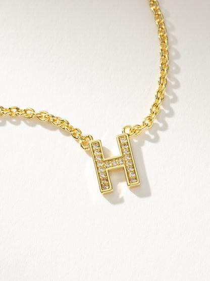 ["Initial Here Necklace ", " Gold H ", " Product Detail Image ", " Uncommon James"]