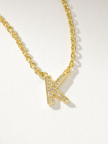 ["Initial Here Necklace ", " Gold K ", " Product Detail Image ", " Uncommon James"]