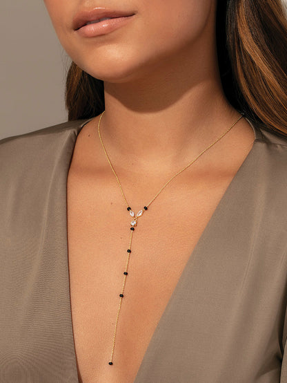 ["Nightlife Lariat Necklace ", " Gold ", " Model Image ", " Uncommon James"]