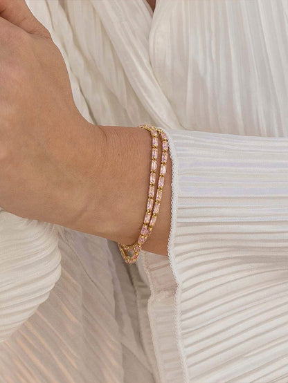 ["Pink Luster Bracelet ", " Gold ", " Model Image 2 ", " Uncommon James"]