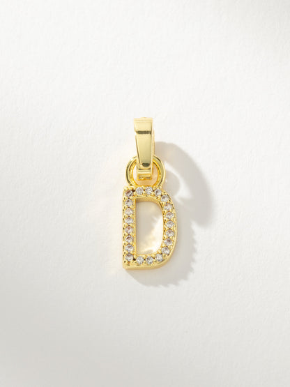 ["Letter Charm ", " Pavé Gold D ", " Product Image ", " Uncommon James"]